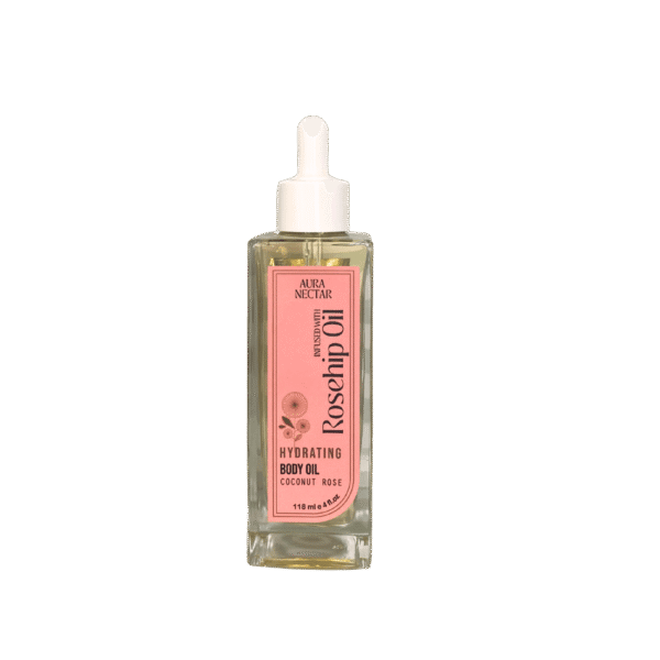 Aura Nectar Rosehip oil Website Aura Nectar Coconut Rose Hydrating Body Oil bottle with rose petals and coconut accents
