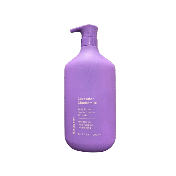 Lavender & Chamomile Body Lotion bottle placed beside fresh lavender flowers and a towel.