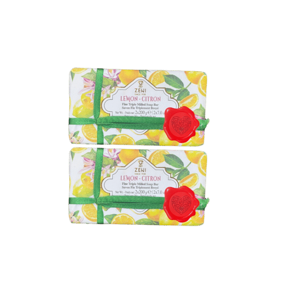 Four-pack of ZENI Lemon-Citron Soap Bars made in Italy, stacked with lemon slices in background