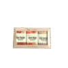 Elegant soap trio with Rose Passion, Sweet Poppy, and Wild Lavender bars wrapped in pastel packaging enriched with goat’s milk.