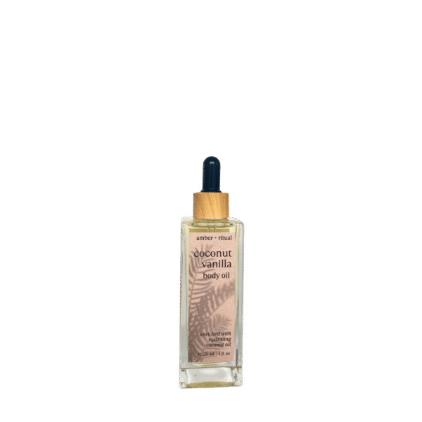 Amber + Ritual Coconut Vanilla Body Oil bottle—hydrating skin oil with coconut and vanilla for a radiant, soft, and nourished glow.