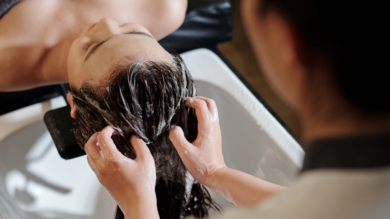 Hair being shampood